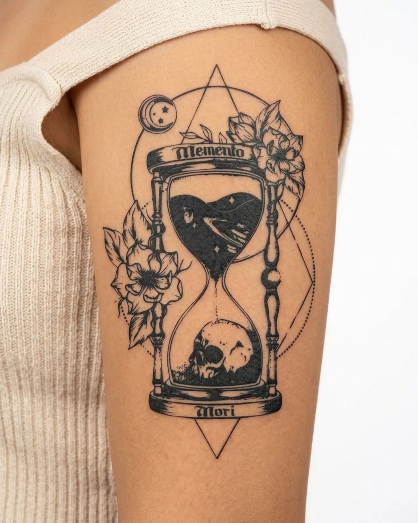 INKY Memento Mori Hourglass semi-permanent tattoo applied on a woman – 4 x 7 in (10x17 cm) design, realistic ink look, lasts 10 days
