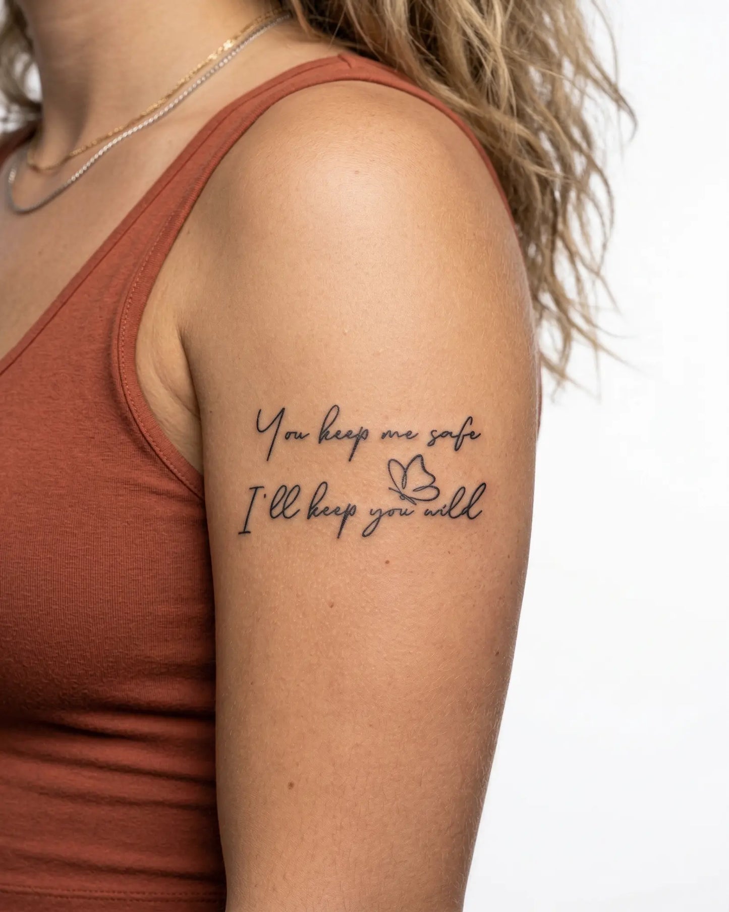 INKY Safe & Wild semi-permanent tattoo applied on a woman – 2 x 4 in (6x10 cm) design, realistic ink look, lasts 10 days