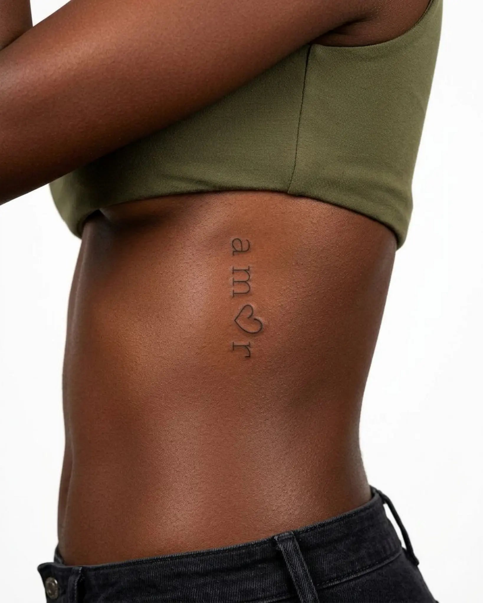 INKY Amor Heart 2 semi-permanent tattoo applied on a woman – 2 x 4 in (6x10 cm) design, realistic ink look, lasts 10 days