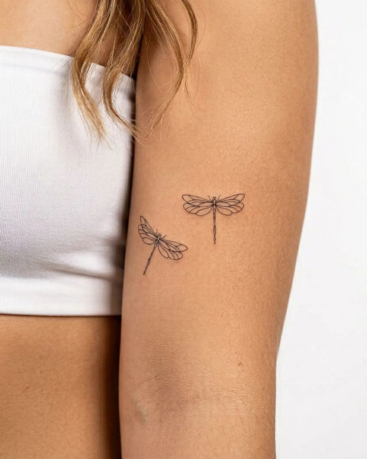 INKY Dragonfly Duo semi-permanent tattoo applied on a woman – 3 x 3 in (7x7 cm) design, realistic ink look, lasts 10 days