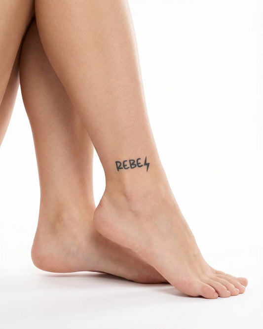 INKY Rebel Bolt semi-permanent tattoo applied on a woman – 2 x 2 in (4x4 cm) design, realistic ink look, lasts 10 days