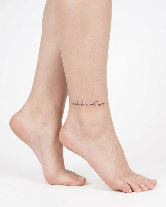 INKY Love Not War 2 semi-permanent tattoo applied on a woman – 2 x 2 in (4x4 cm) design, realistic ink look, lasts 10 days