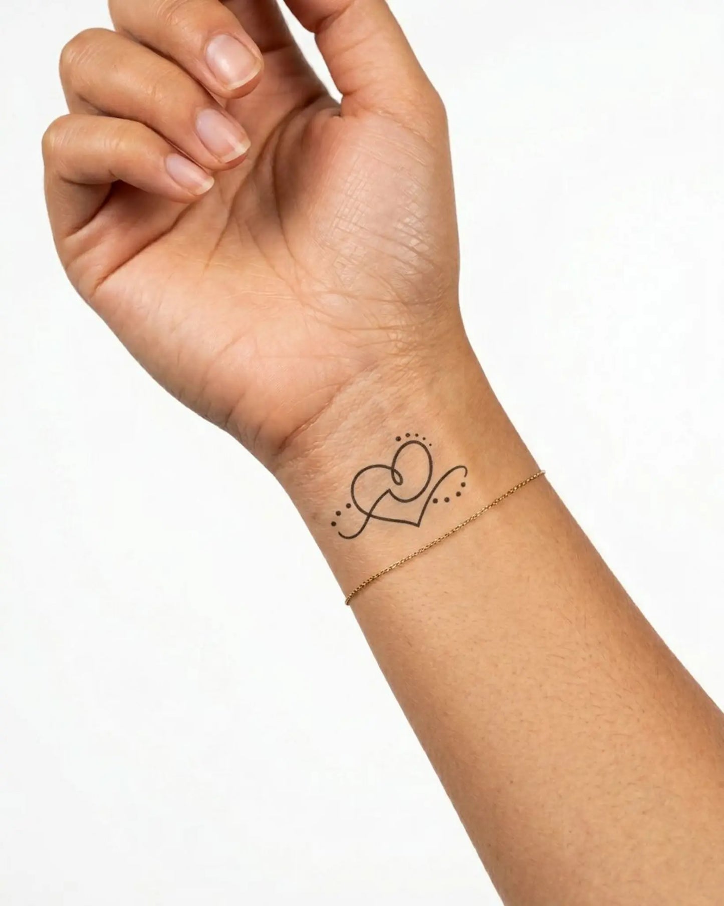 INKY Love Line semi-permanent tattoo applied on a woman – 2 x 2 in (4x4 cm) design, realistic ink look, lasts 10 days