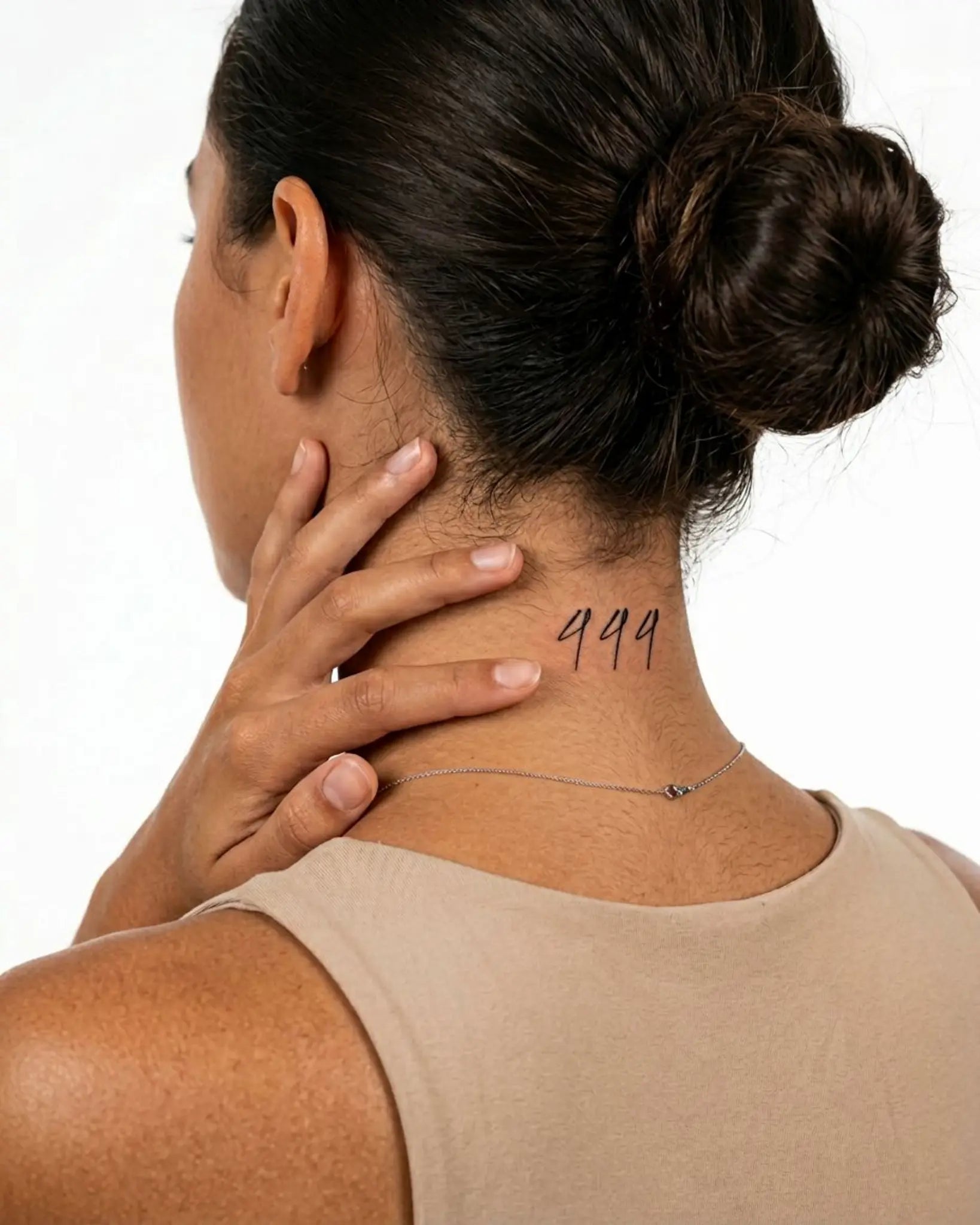 INKY Angel 444 semi-permanent tattoo applied on a woman – 2 x 2 in (4x4 cm) design, realistic ink look, lasts 10 days