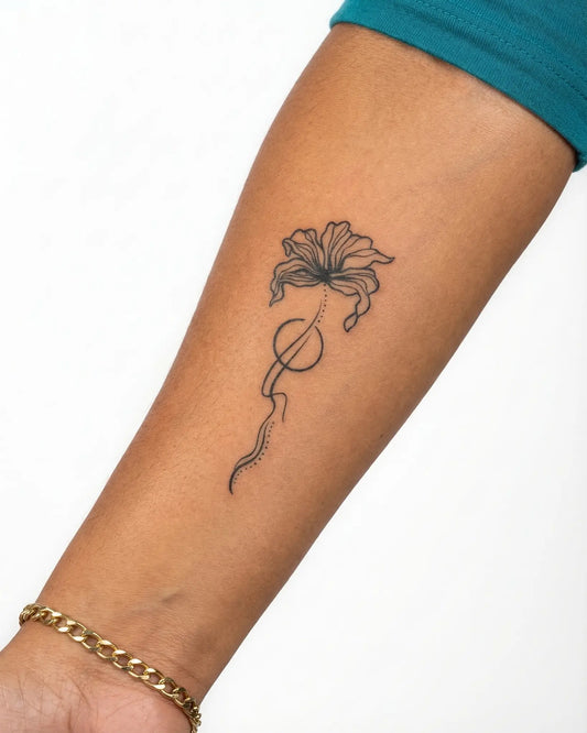INKY Abstract Bloo semi-permanent tattoo applied on a woman – 2 x 4 in (6x10 cm) design, realistic ink look, lasts 10 days