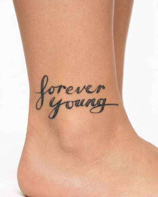 INKY Forever Young semi-permanent tattoo applied on a woman – 2 x 2 in (4x4 cm) design, realistic ink look, lasts 10 days