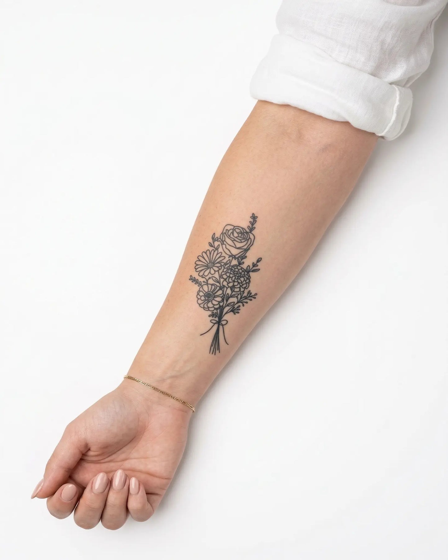 INKY Floral semi-permanent tattoo applied on a woman – 2 x 4 in (6x10 cm) design, realistic ink look, lasts 10 days