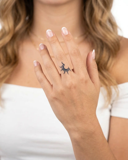 INKY Dark Sol semi-permanent tattoo applied on a woman – 0.5 x 0.5 in (1x1 cm) design, realistic ink look, lasts 10 days