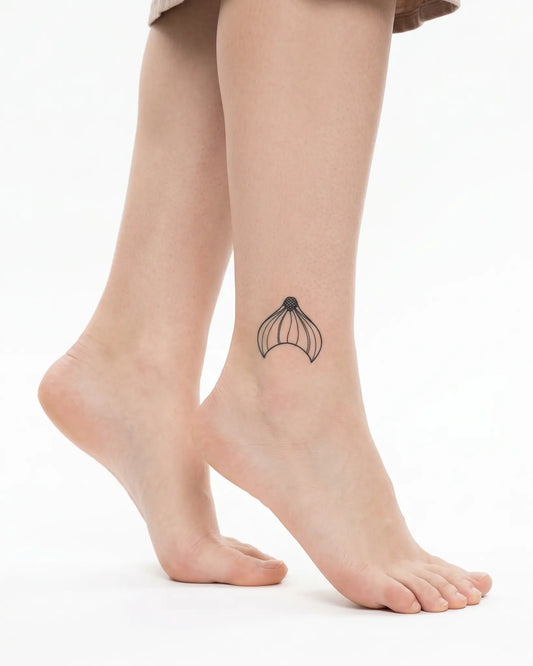 INKY Mermaid Tail semi-permanent tattoo applied on a woman – 2 x 2 in (4x4 cm) design, realistic ink look, lasts 10 days
