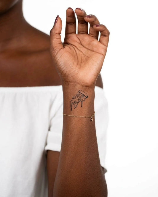 INKY Pizza Drip semi-permanent tattoo applied on a woman – 2 x 2 in (4x4 cm) design, realistic ink look, lasts 10 days