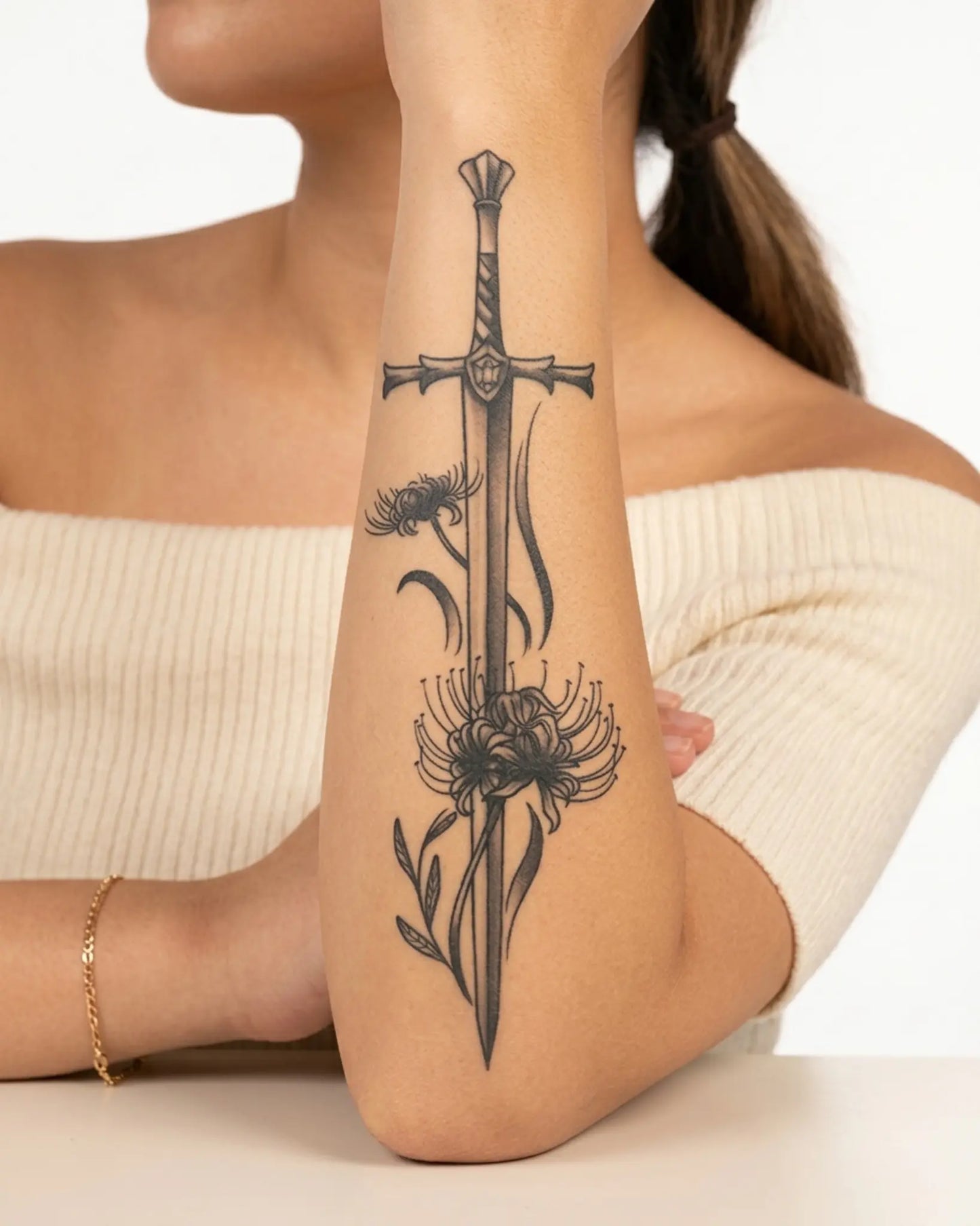 INKY Lily Blade semi-permanent tattoo applied on a woman – 4 x 7 in (10x17 cm) design, realistic ink look, lasts 10 days