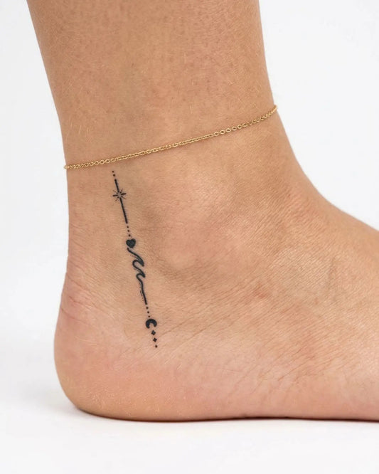 INKY Soul Journey semi-permanent tattoo applied on a woman – 2 x 2 in (4x4 cm) design, realistic ink look, lasts 10 days