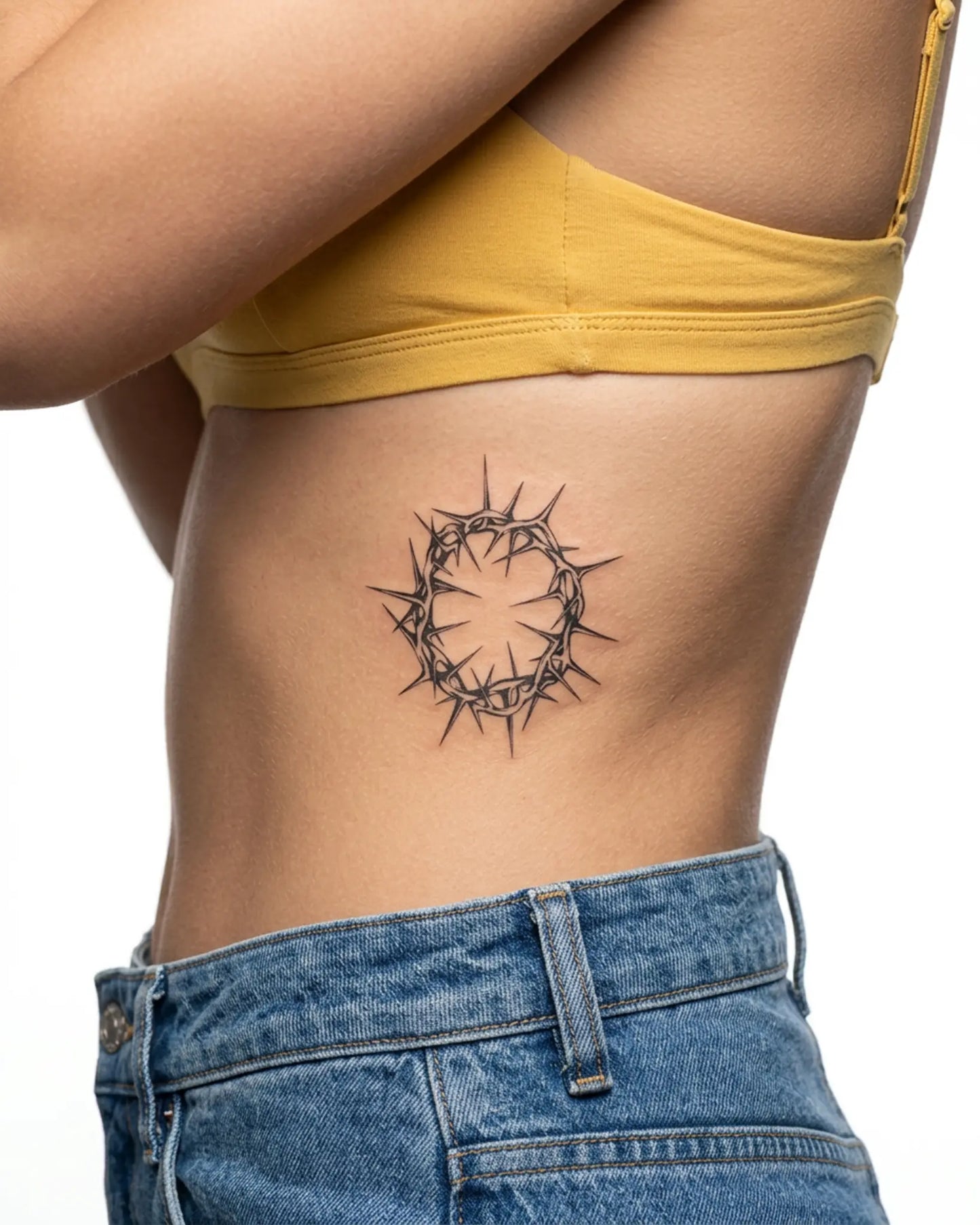 INKY Thorn Crown semi-permanent tattoo applied on a woman – 3 x 3 in (7x7 cm) design, realistic ink look, lasts 10 days