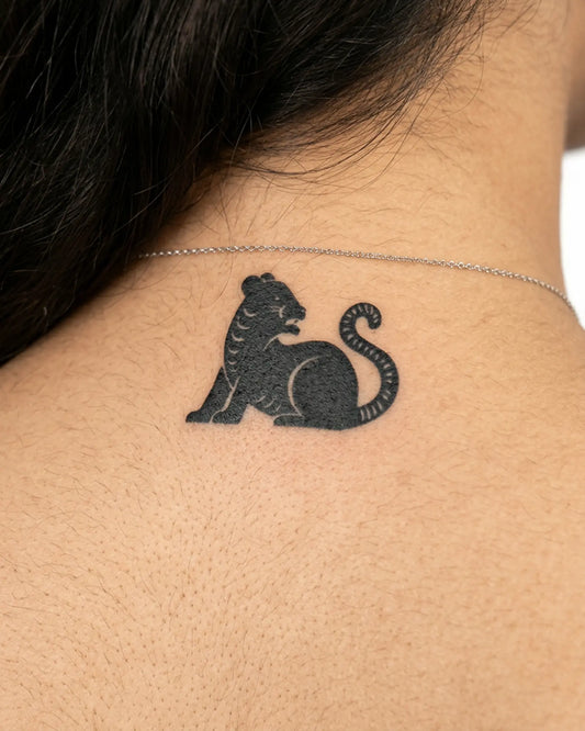 INKY Black Panther semi-permanent tattoo applied on a woman – 2 x 2 in (4x4 cm) design, realistic ink look, lasts 10 days