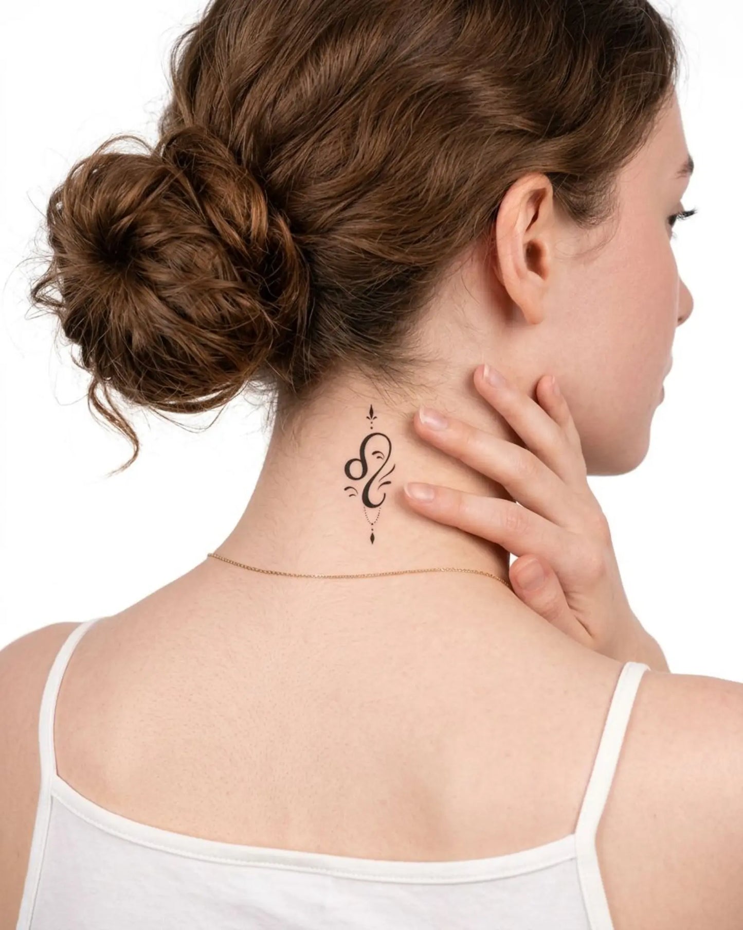 INKY Elegant Leo semi-permanent tattoo applied on a woman – 2 x 2 in (4x4 cm) design, realistic ink look, lasts 10 days