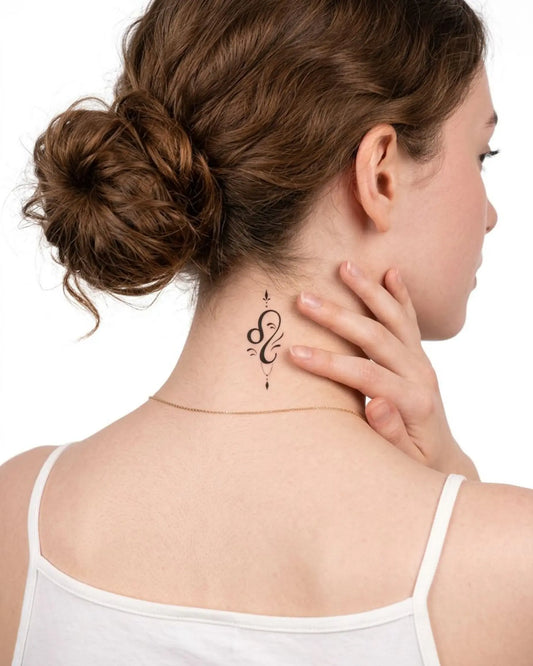 INKY Elegant Leo semi-permanent tattoo applied on a woman – 2 x 2 in (4x4 cm) design, realistic ink look, lasts 10 days