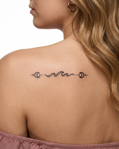 INKY Moon Waves semi-permanent tattoo applied on a woman – 2 x 4 in (6x10 cm) design, realistic ink look, lasts 10 days