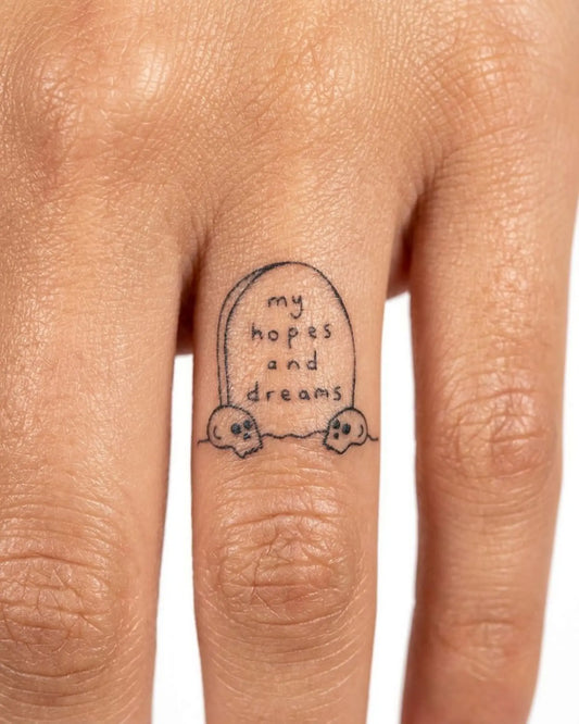 INKY RIP Dreams semi-permanent tattoo applied on a woman – 0.5 x 0.5 in (1x1 cm) design, realistic ink look, lasts 10 days