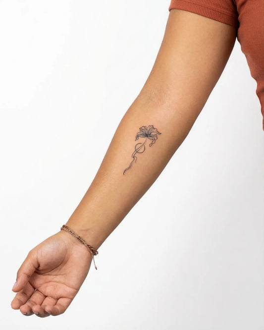 INKY Graceful Bloo semi-permanent tattoo applied on a woman – 2 x 4 in (6x10 cm) design, realistic ink look, lasts 10 days
