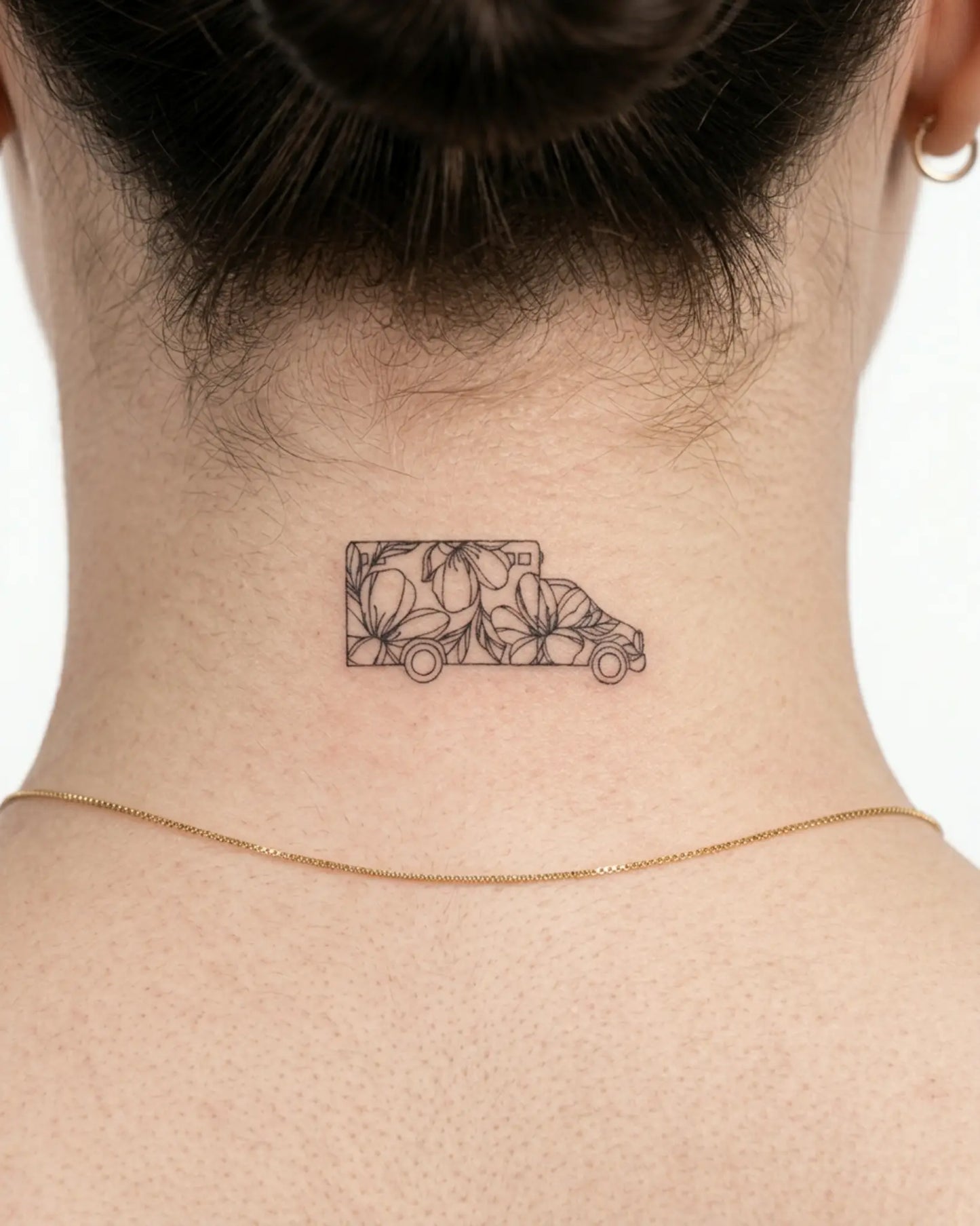 INKY Flower Van semi-permanent tattoo applied on a woman – 2 x 2 in (4x4 cm) design, realistic ink look, lasts 10 days
