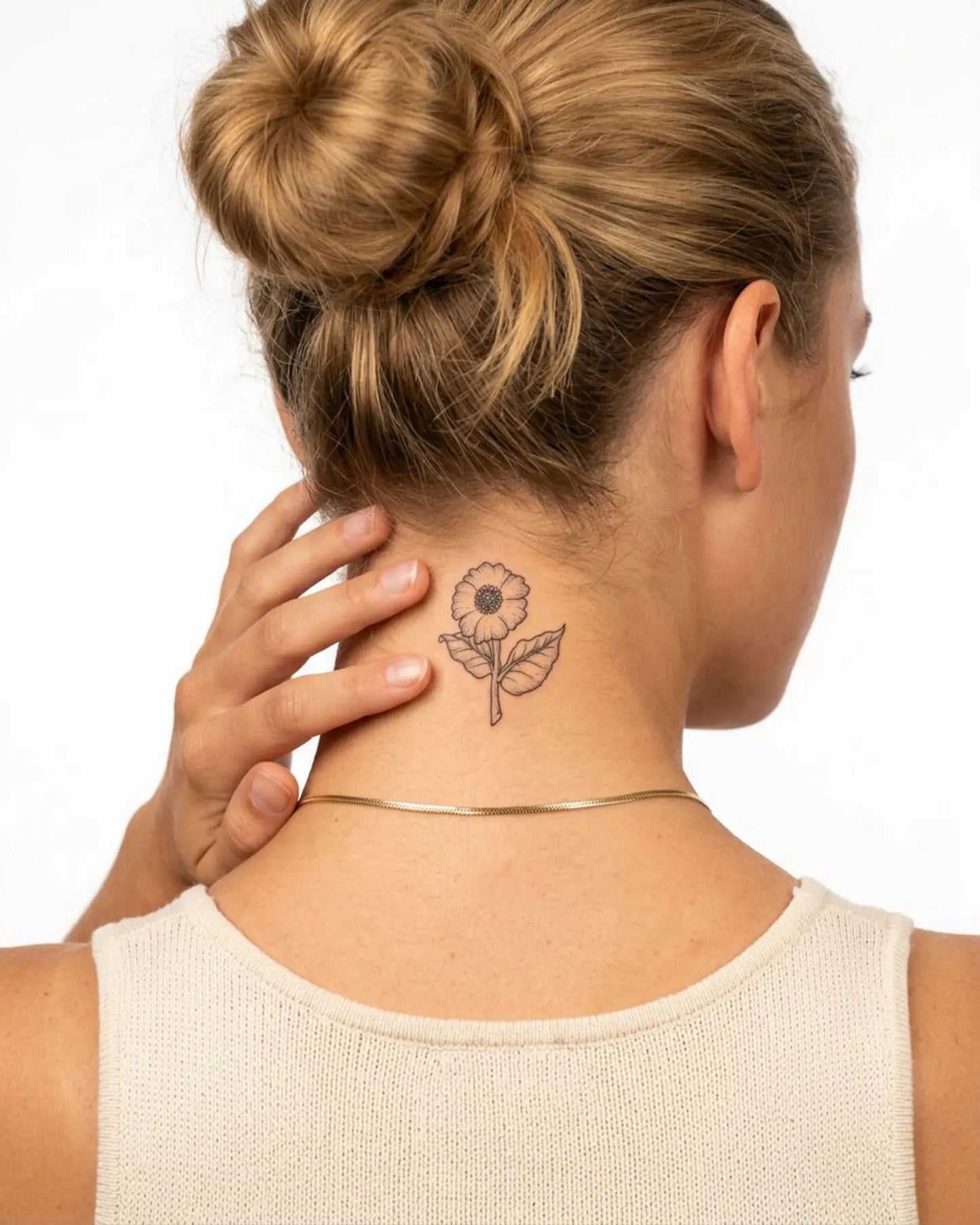 INKY Bloom Art 2 semi-permanent tattoo applied on a woman – 2 x 2 in (4x4 cm) design, realistic ink look, lasts 10 days