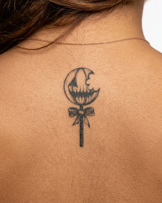 INKY Spooky Pop semi-permanent tattoo applied on a woman – 2 x 4 in (6x10 cm) design, realistic ink look, lasts 10 days