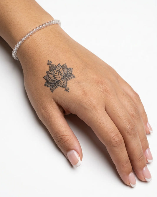INKY Lotus Mandala semi-permanent tattoo applied on a woman – 2 x 2 in (4x4 cm) design, realistic ink look, lasts 10 days