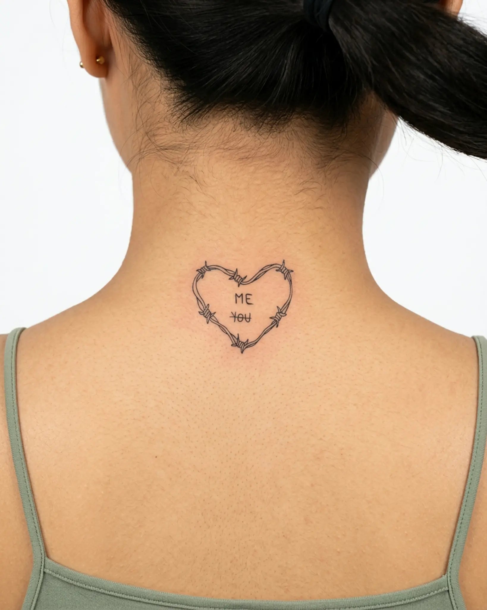 INKY Wire Heart semi-permanent tattoo applied on a woman – 2 x 2 in (4x4 cm) design, realistic ink look, lasts 10 days