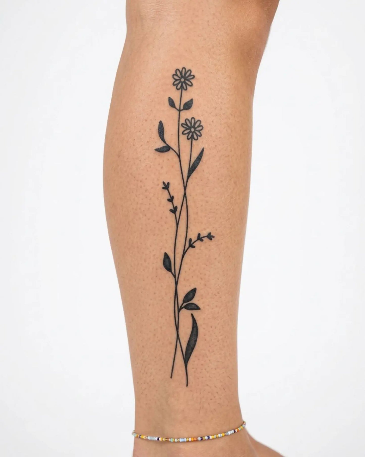 INKY Pair of flowers semi-permanent tattoo applied on a woman – 4 x 7 in (10x17 cm) design, realistic ink look, lasts 10 days
