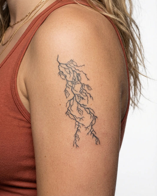INKY Branch Bolt semi-permanent tattoo applied on a woman – 2 x 4 in (6x10 cm) design, realistic ink look, lasts 10 days