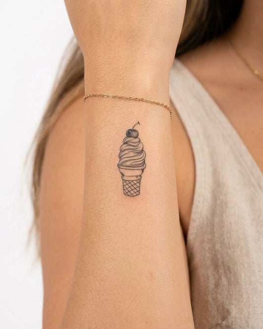 INKY Sweet Treat semi-permanent tattoo applied on a woman – 2 x 2 in (4x4 cm) design, realistic ink look, lasts 10 days