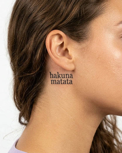 INKY Hakuna Matata semi-permanent tattoo applied on a woman – 2 x 2 in (4x4 cm) design, realistic ink look, lasts 10 days