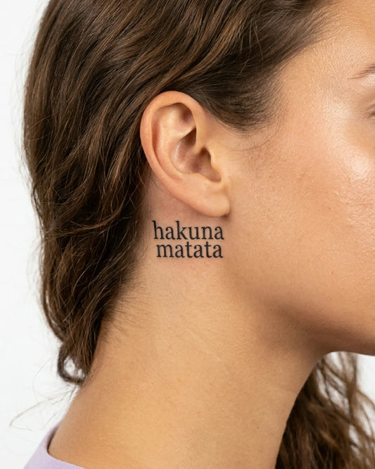 INKY Hakuna Matata semi-permanent tattoo applied on a woman – 2 x 2 in (4x4 cm) design, realistic ink look, lasts 10 days