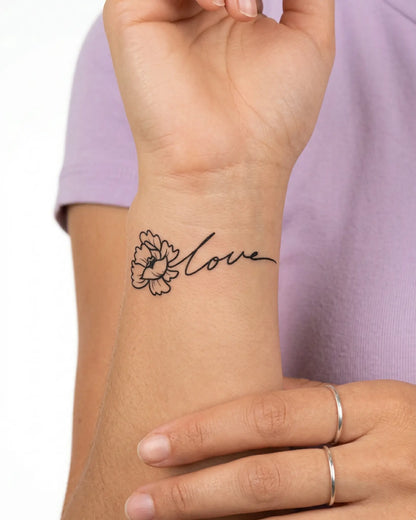 INKY Love Bloom semi-permanent tattoo applied on a woman – 2 x 2 in (4x4 cm) design, realistic ink look, lasts 10 days