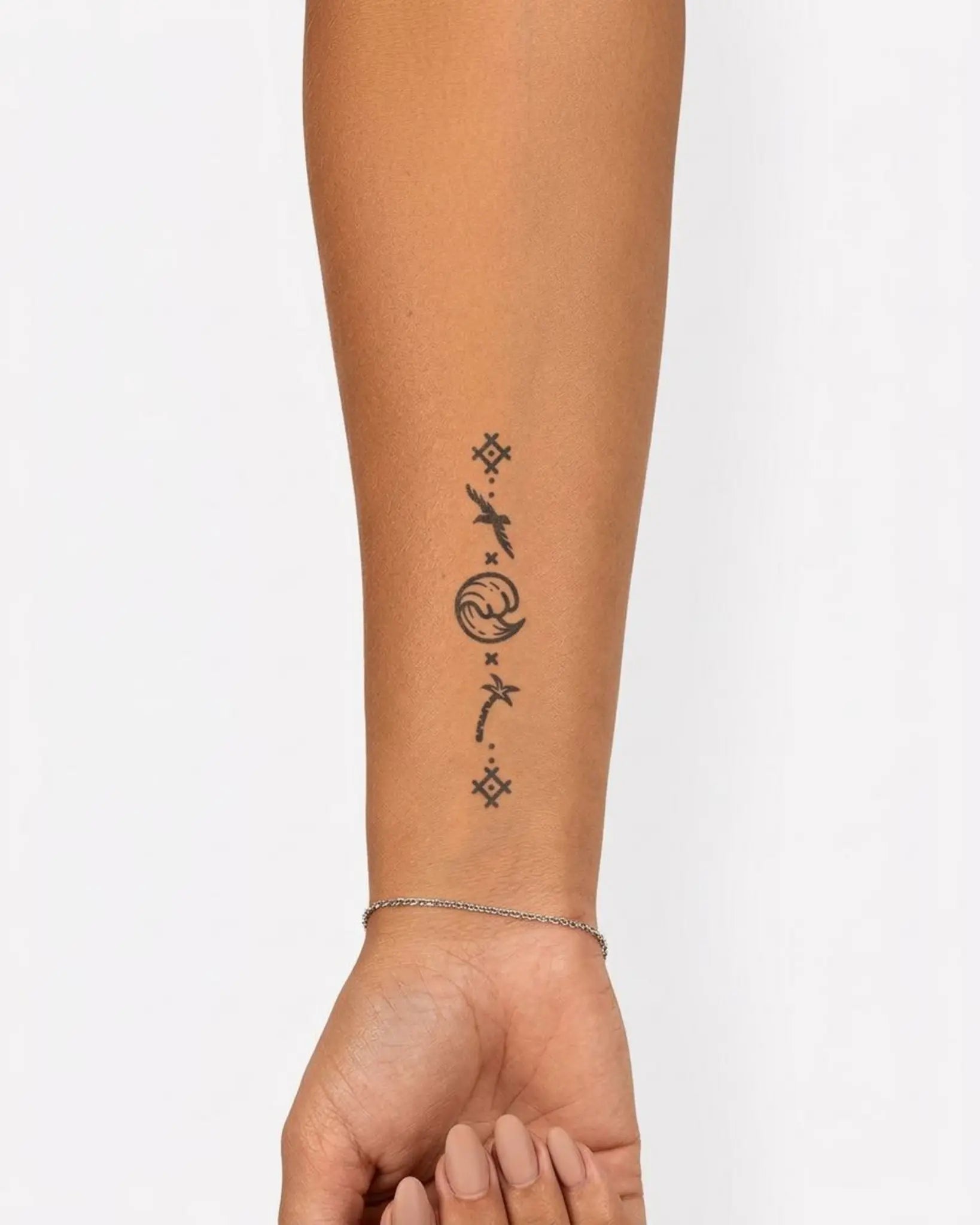 INKY Sea Escape semi-permanent tattoo applied on a woman – 2 x 4 in (6x10 cm) design, realistic ink look, lasts 10 days