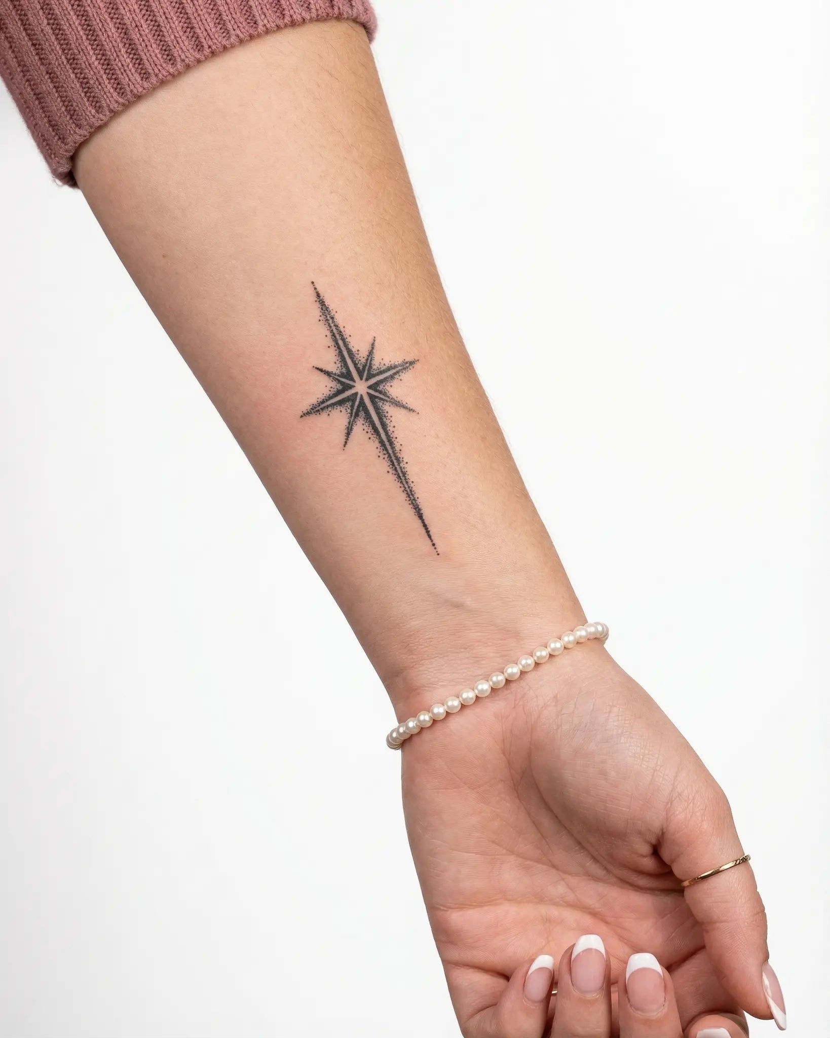INKY Starlight semi-permanent tattoo applied on a woman – 2 x 4 in (6x10 cm) design, realistic ink look, lasts 10 days