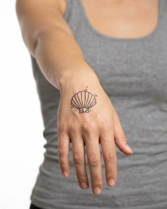 INKY Sea Bubble semi-permanent tattoo applied on a woman – 2 x 2 in (4x4 cm) design, realistic ink look, lasts 10 days