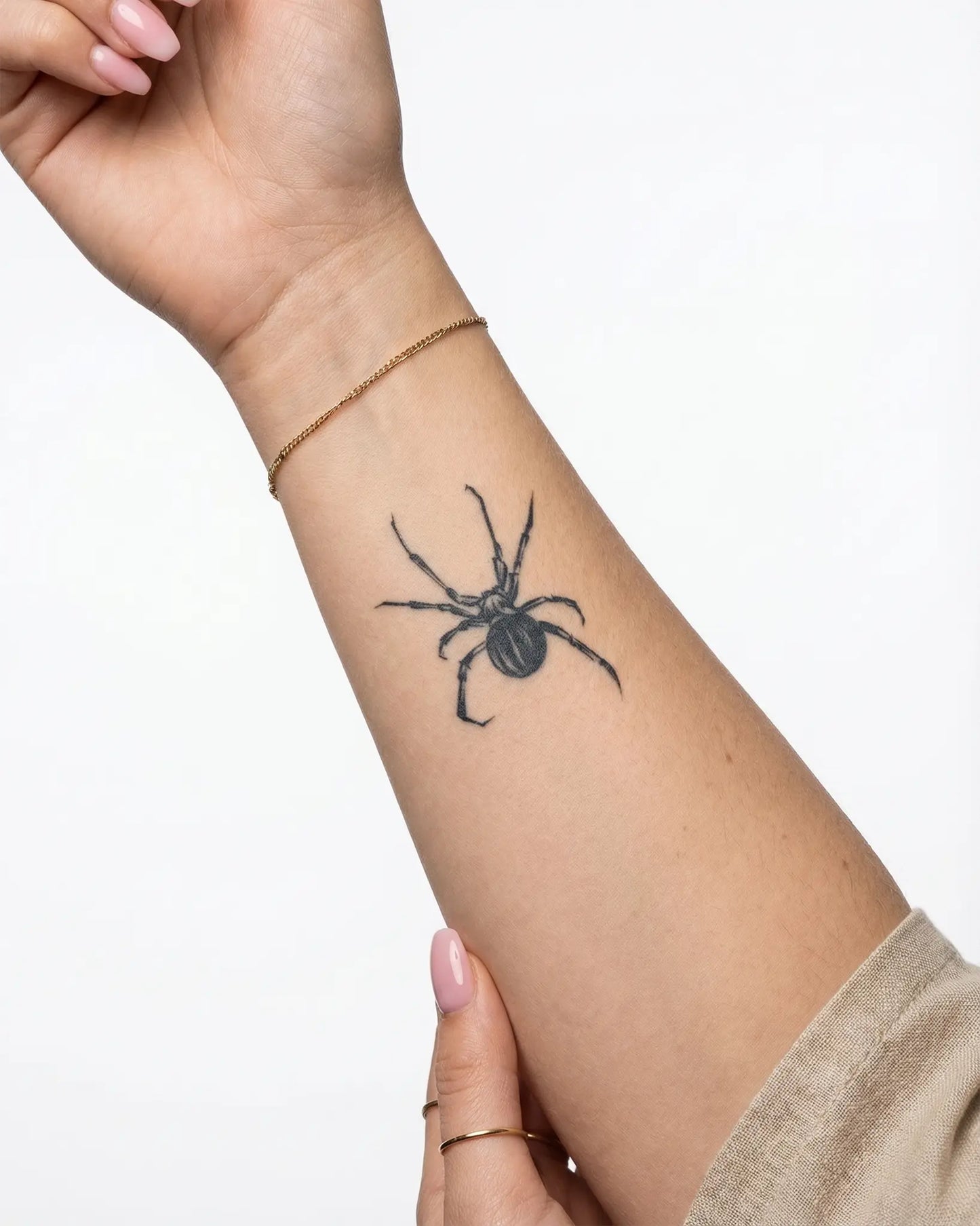 INKY Ink Spider 2 semi-permanent tattoo applied on a woman – 2 x 2 in (4x4 cm) design, realistic ink look, lasts 10 days
