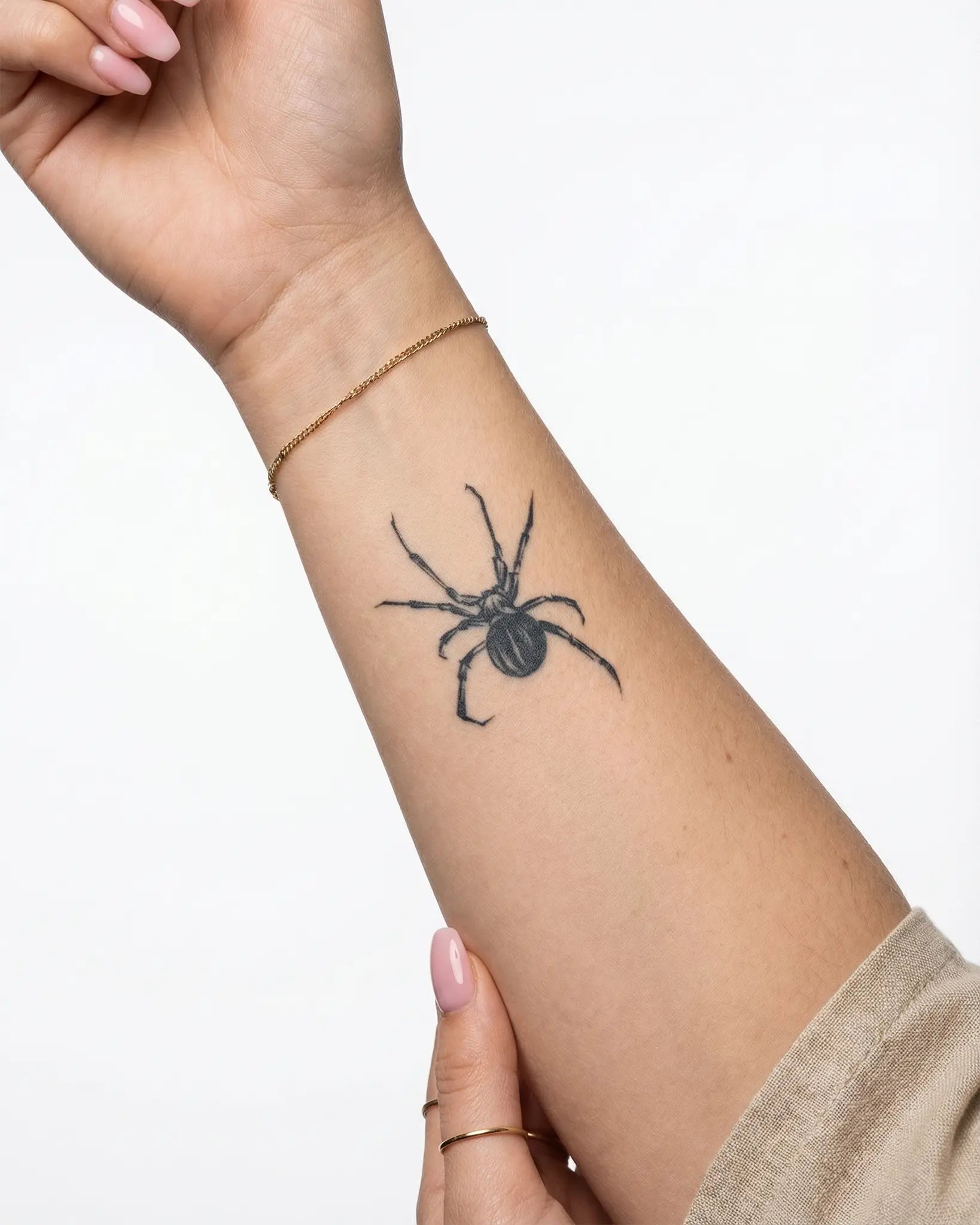 INKY Ink Spider 2 semi-permanent tattoo applied on a woman – 2 x 2 in (4x4 cm) design, realistic ink look, lasts 10 days