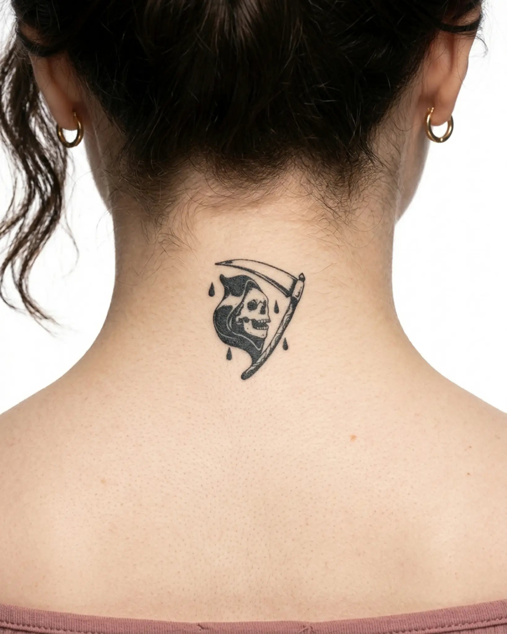 INKY Reaper Scythe semi-permanent tattoo applied on a woman – 2 x 2 in (4x4 cm) design, realistic ink look, lasts 10 days