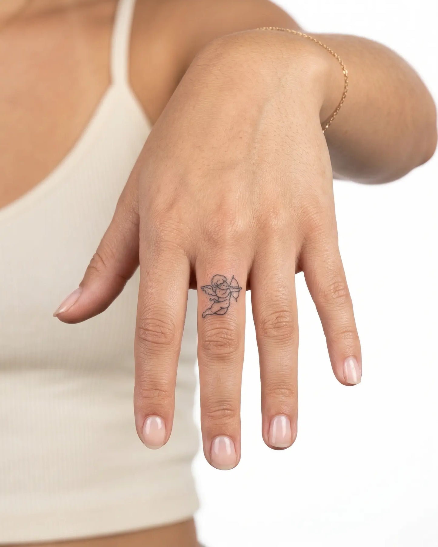 INKY Love Archer semi-permanent tattoo applied on a woman – 0.5 x 0.5 in (1x1 cm) design, realistic ink look, lasts 10 days
