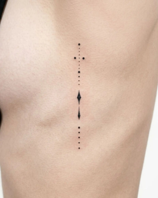 INKY Spirit Line 2 semi-permanent tattoo applied on a woman – 2 x 4 in (6x10 cm) design, realistic ink look, lasts 10 days