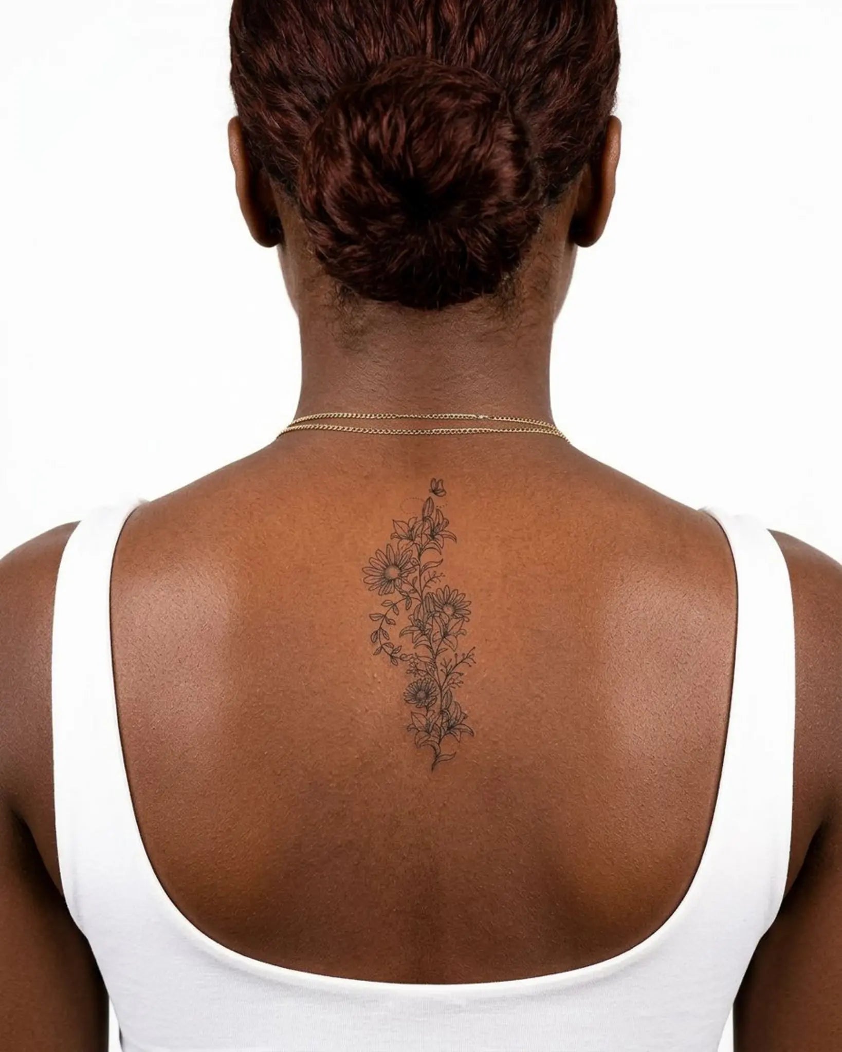 INKY Floral Swirl semi-permanent tattoo applied on a woman – 2 x 4 in (6x10 cm) design, realistic ink look, lasts 10 days