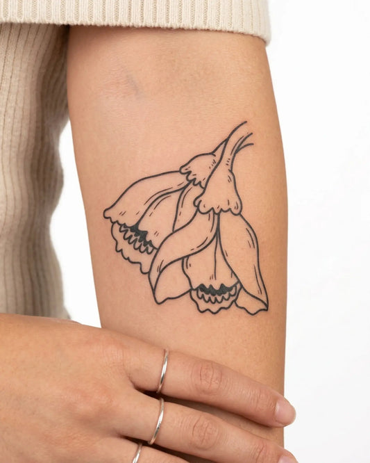 INKY Bellflower 2 semi-permanent tattoo applied on a woman – 3 x 3 in (7x7 cm) design, realistic ink look, lasts 10 days