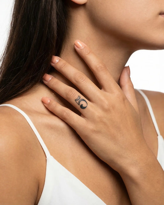 INKY Dotwork 5 semi-permanent tattoo applied on a woman – 0.5 x 0.5 in (1x1 cm) design, realistic ink look, lasts 10 days