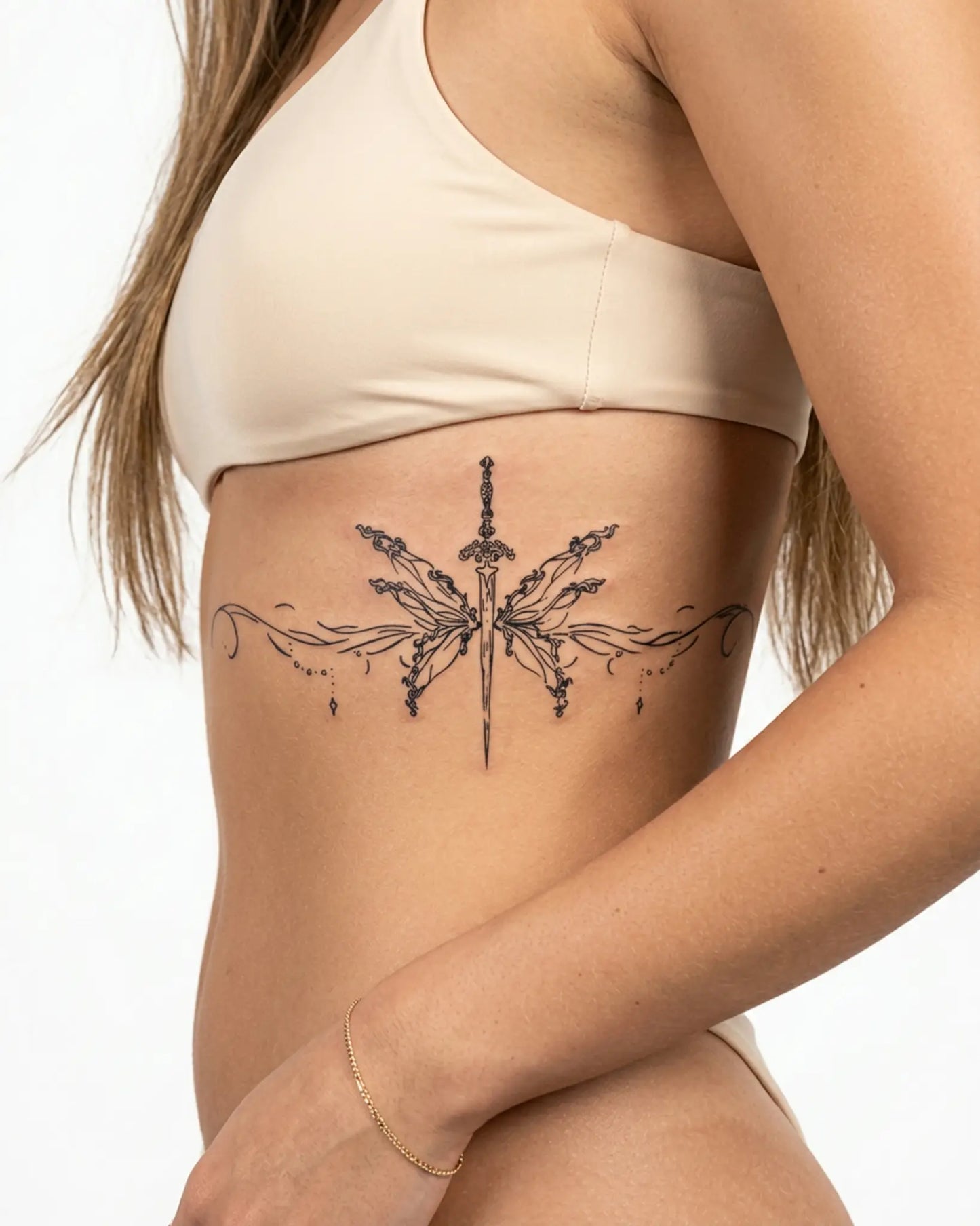 INKY Mystic Blade semi-permanent tattoo applied on a woman – 4 x 8 in (11x20 cm) design, realistic ink look, lasts 10 days