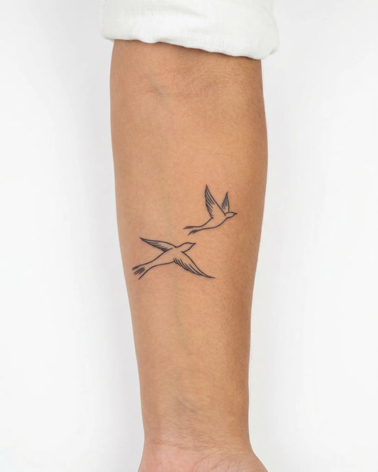 INKY Flying Birds semi-permanent tattoo applied on a woman – 3 x 3 in (7x7 cm) design, realistic ink look, lasts 10 days
