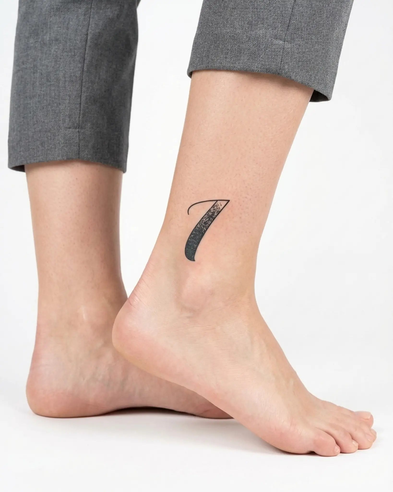 INKY Lucky Seven 2 semi-permanent tattoo applied on a woman – 2 x 2 in (4x4 cm) design, realistic ink look, lasts 10 days