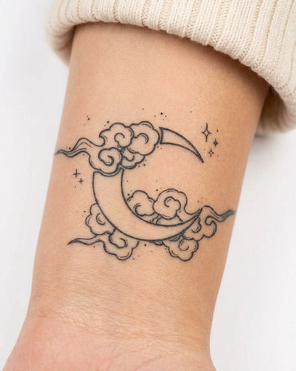 INKY Cloud Moon semi-permanent tattoo applied on a woman – 2 x 2 in (4x4 cm) design, realistic ink look, lasts 10 days