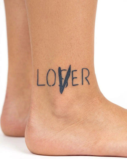 INKY Lover/Loser semi-permanent tattoo applied on a woman – 2 x 2 in (4x4 cm) design, realistic ink look, lasts 10 days